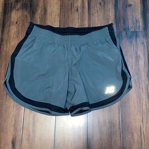 new balance army green and black running shorts